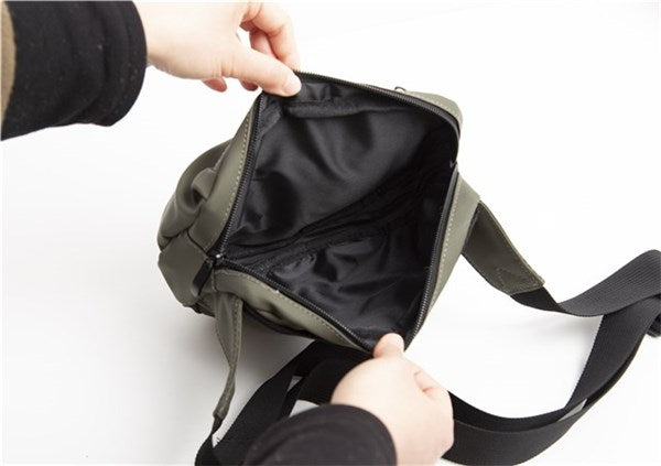 Changing bag Mini by BabyDan, green - Fanny Pack changing bag with changing mat